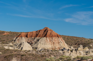 Grand Staircase Escalante National Monument landscape of two-toned barren hillside at the Paria Rimrocks