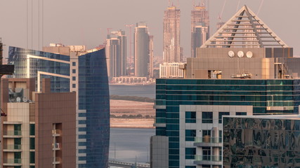 Construction of new skyscrapers in Dubai Creek Harbor aerial timelapse. Dubai - UAE.