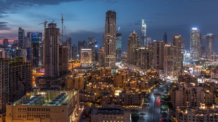 Dubai Downtown skyline during sunset timelapse with modern towers paniramic view from the top in Dubai