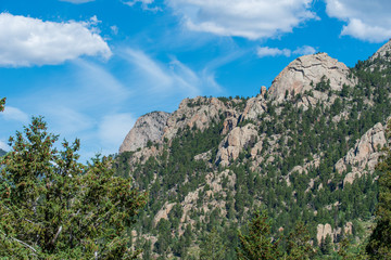 Fototapeta na wymiar Rocky Mountain National Park low angle landscape of mountains and greenery at Lumpy Ridge Trail