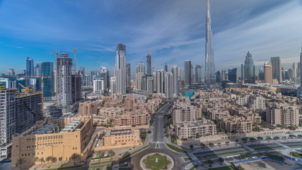 Dubai Downtown skyline timelapse with Burj Khalifa and other towers paniramic view from the top in Dubai