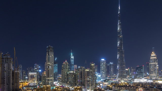 Dubai Downtown skyline during all night timelapse with Burj Khalifa and other towers paniramic view from the top in Dubai © neiezhmakov