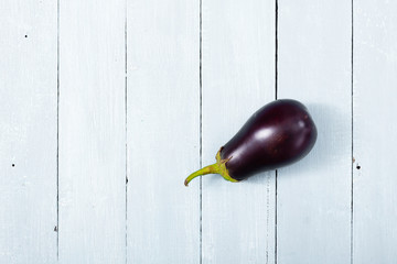 eggplant on shabby chic bright wood table