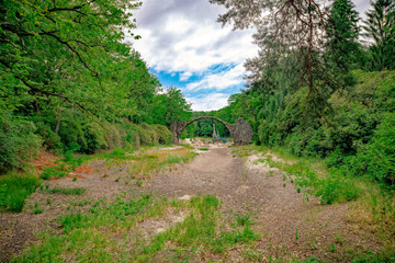 Fototapeta na wymiar Rakotz Bridge, Azalea and Rhododendron Park in Kromlau