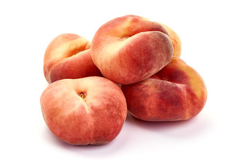 Flat Peaches, ripe nectarines, isolated on white background