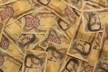 Very old. outdated vintage bolivares 100 bank note currency bill venezuelan bills.