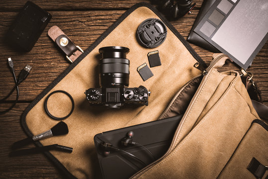 photography gear on wooden table