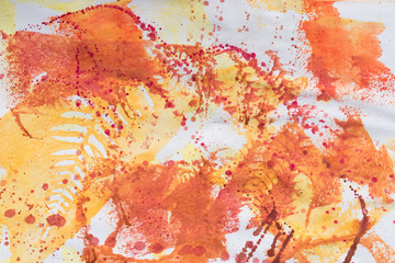 multicolored fall leaves printed on white paper background