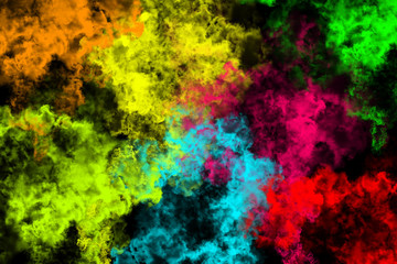 Obraz na płótnie Canvas abstract colored dust explosion on a black background.abstract powder splatted background.