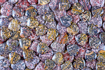 Pile of leopard skin jasper hearts