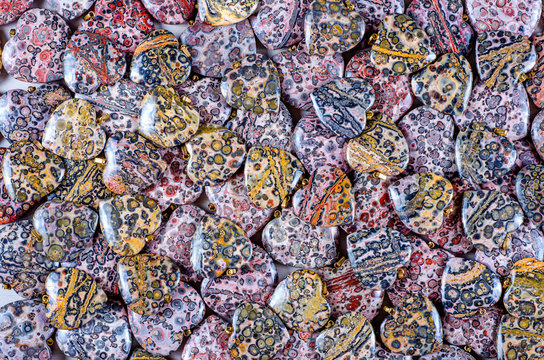 Pile of leopard skin jasper hearts