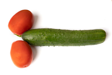 Vegetables, tomatoes and cucumber isolated on white background. The concept of agriculture, healthy lifestyle, healthy eating and diet.