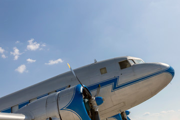 Old russian propeller airplane in an old airfield. © skovalsky