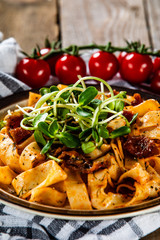 Pasta with sauce and sun-dried tomatoes