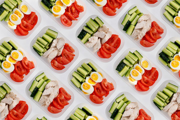 Healthy food distributed in containers. Top view.