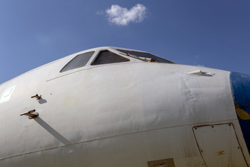 Fototapeta na wymiar Nose of an old russian airplane on a summer day.