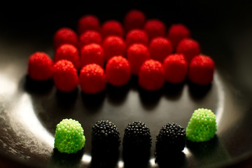 Fruit candy on black. Delicious fruit candy. Multicolored fruit candy. - 282923920