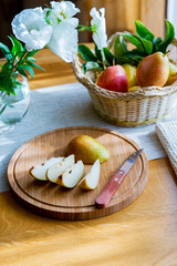 pear, ripe juicy pear on the kitchen table