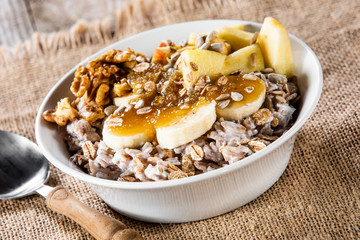 Porridge with nuts, fruits and honey