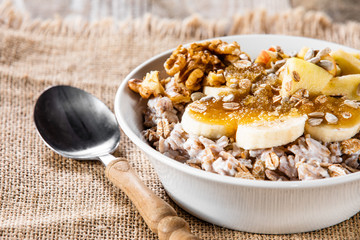 Porridge with nuts, fruits and honey