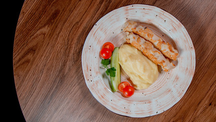 Russian kitchen. Mashed potatoes with chicken kebab