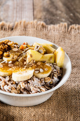 Porridge with nuts, fruits and honey