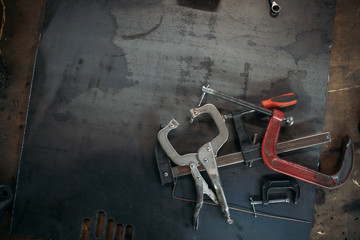 Wrench set of production stuff for work or repair. tools on dark metallic background. Top view....