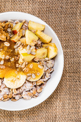 Porridge with nuts, fruits and honey