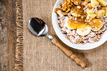 Porridge with nuts, fruits and honey