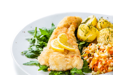 Fish dish - fried fish fillet boiled potatoes and vegetables