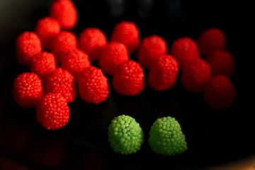 Fruit candy on black. Delicious fruit candy. Multicolored fruit candy. - 282928190