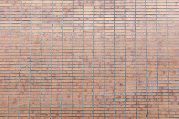Brown orange color brick wall texture, background