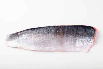 isolated skin side salmon fillet on white background