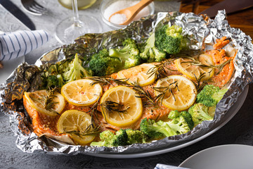 grilled whole salmon fillet with lemon and rosemarry