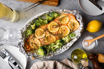 grilled whole salmon fillet with lemon and rosemarry