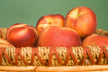 Fresh Peaches in a Basket