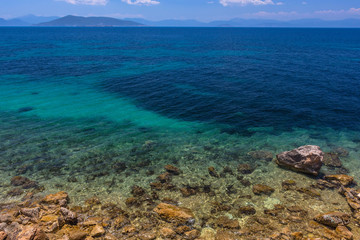 The clear and blue waters of Mediterranean sea in the Saronic gulf, Greece.