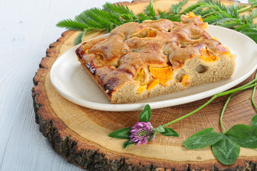 Butter cake with dried figs and dried apricots. strudel with dried fruits - apricots, figs, raisins, cottage cheese. Winter, christmas decor. Rustic style.