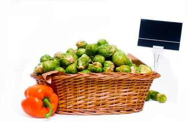 Basket full of Brussels sprouts.