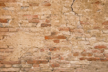 Old rough grunge concrete and brick wall, for usage as a background