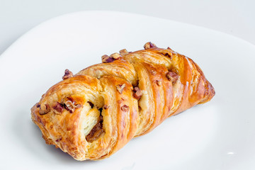 Plain croissant on white background