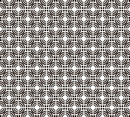 Seamless geometric pattern of black circles on a white background.