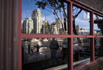 Granville Island Downtown Reflections. Yaletown and False Creek Marina viewed from Granville Island. Vancouver, British Columbia, Canada.