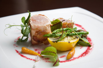 fresh tuna with green asparagus, gourmet dish in restaurant. combination of color and flavor.