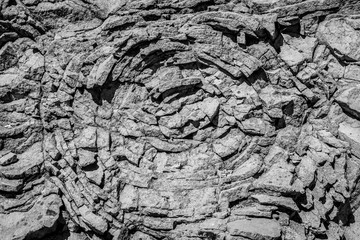 Sedimentary rock. Structure of natural stone. Background. Black and white.