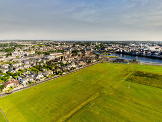 Fototapeta na wymiar South park, Aerial view, sunny warm day, cloudy sky, Galway city, Claddagh, Ireland.