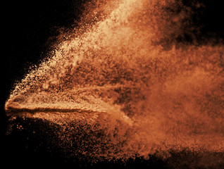 a shot from a firearm, an explosion of gunpowder on a black background, a bright flash with flying particles, abstract shape - 282941596