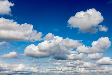 Background image - cumulus clouds on a background of blue sky