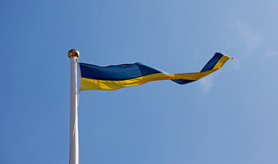 Swedish flag as pennant on flagpole in Umea