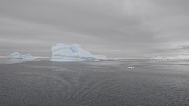 Antarctic seascape with iceberg at sea made from expedition vessel